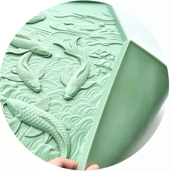 Flexible fish-relief mat showing the patterned face and reverse